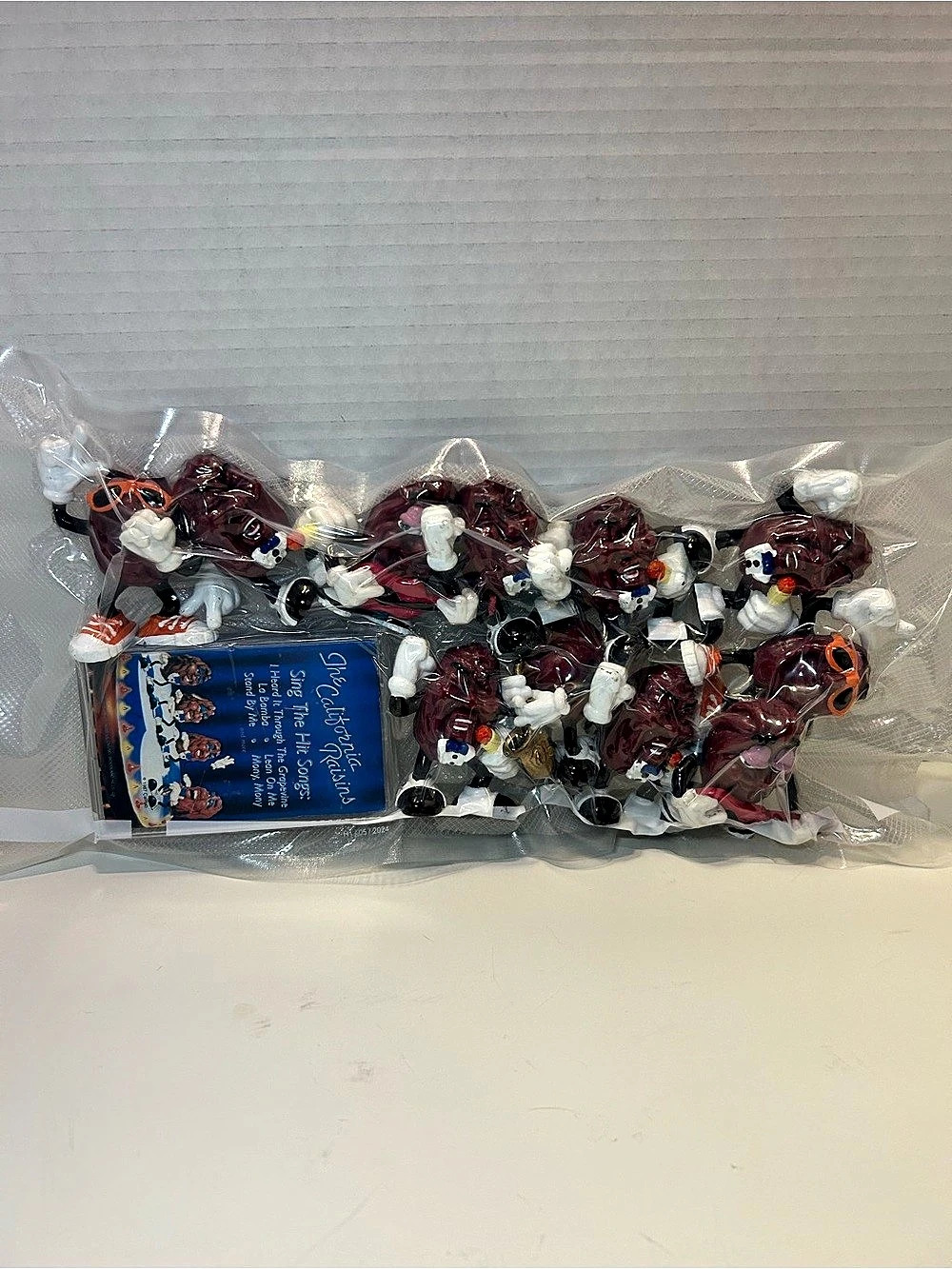 The California Raisins Figurine Set with Cassette